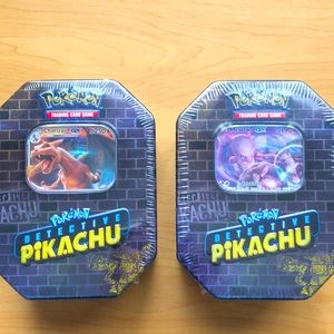 Pokémon Mewtwo and Charizard tin.